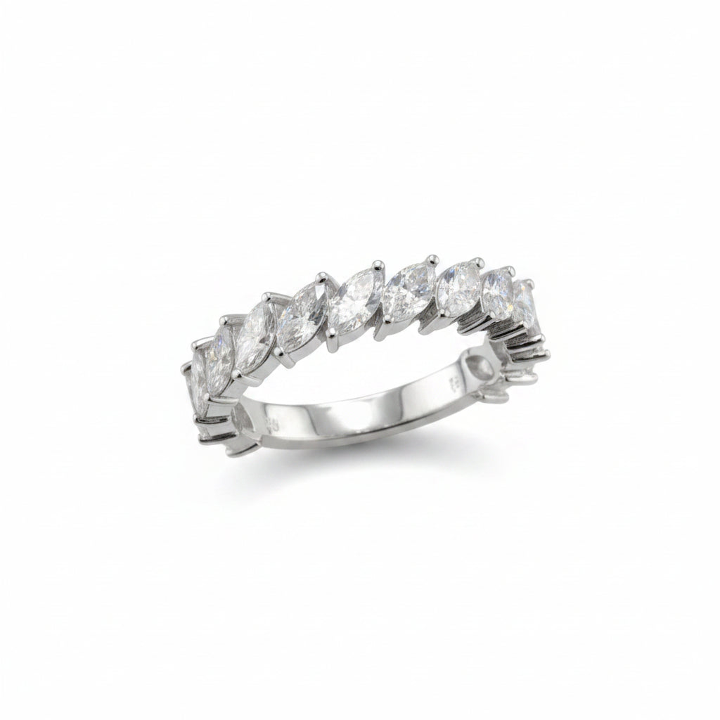 A silver-tone diamond eternity ring featuring marquise-cut and round brilliant diamonds set in a continuous band, displayed on a white background.
