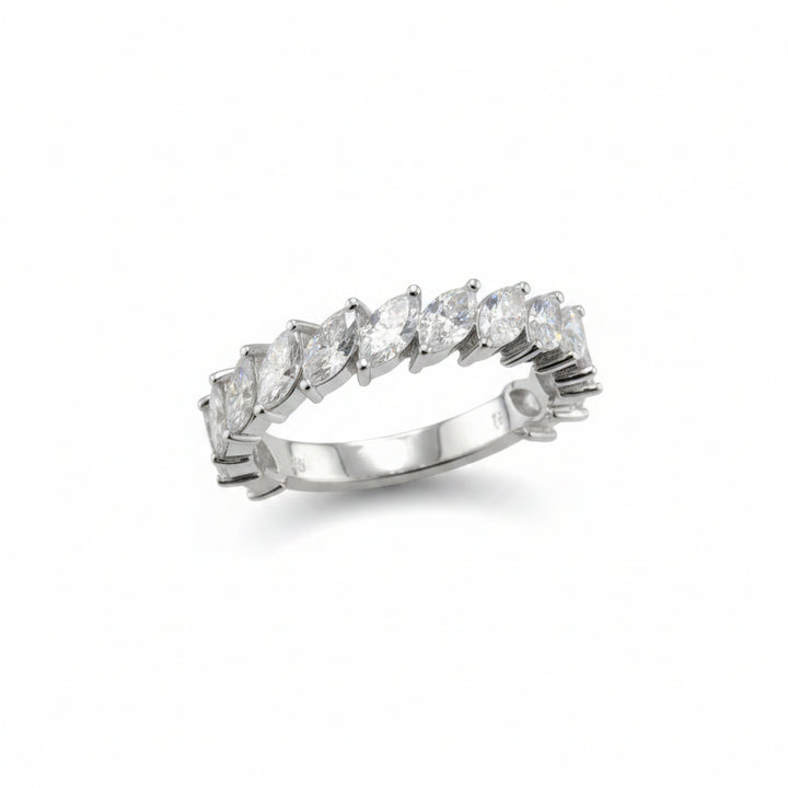 A silver-tone diamond eternity ring featuring marquise-cut and round brilliant diamonds set in a continuous band, displayed on a white background.